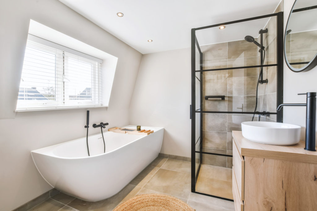Delightful bathroom with a bathtub near the window