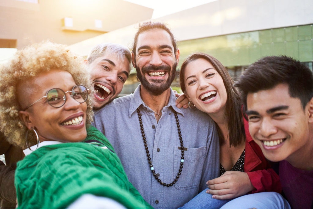 Group Of Friends Having Fun Together Outdoors